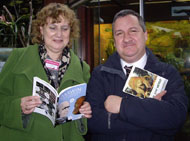 Julie Bowie, Bristol Libraries, and James Taljaard, Arts & Business, in Bristol Zoo Garden's reptile house on launch day.