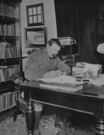 Conan Doyle at his desk in London c 1890/1891 (reprinted by kind permission of the Royal College of Surgeons of Edinburgh).